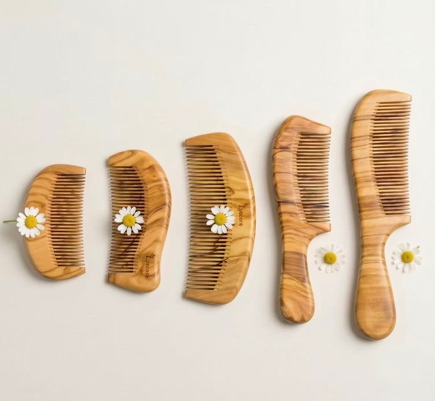 olive wood comb Handcrafted olive wood hair combs in multiple sizes