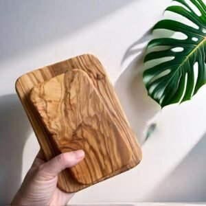 Portable Italian olive wood serving board and fruit platter in small and medium sizes, rectangular shape with rounded edges for outdoor dining.