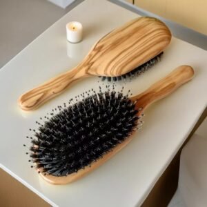 Luxury Italian olive wood hairbrush with natural boar bristles and air cushion base