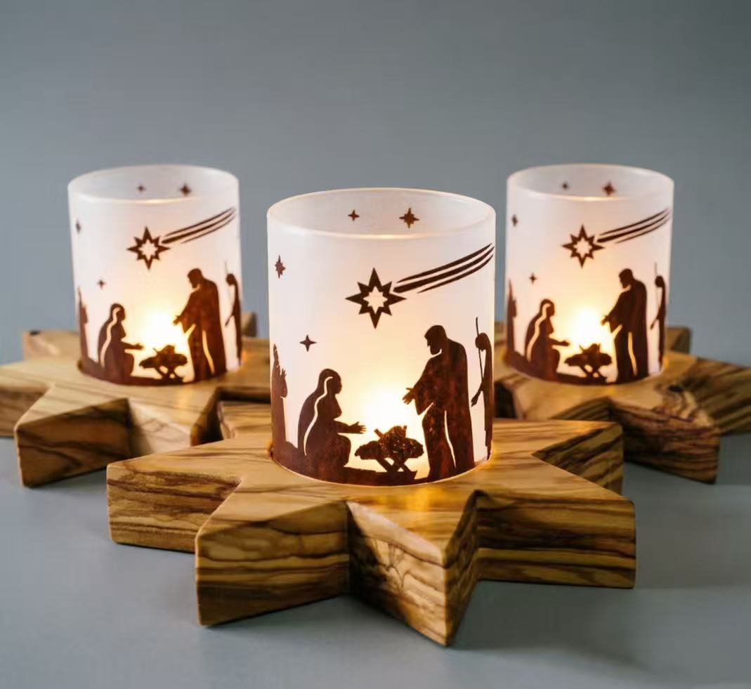 A close-up shot of an olive wood star-shaped tealight holder